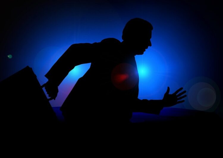 Symbolbild, Geschäftsmann auf der Flucht, pixabay